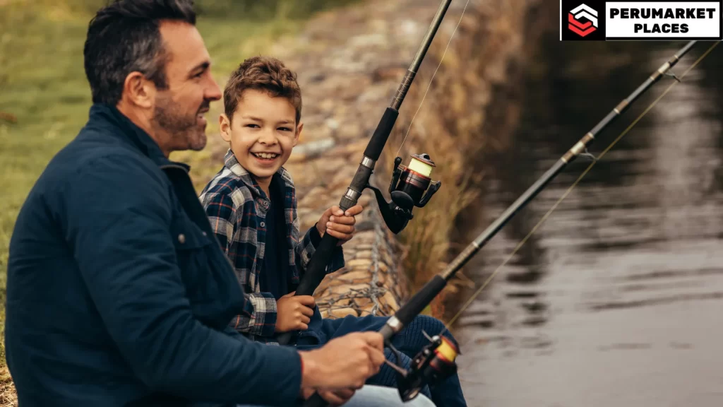 A father and son enjoying a day of fishing by the water, sharing smiles while holding fishing rods. Can you go fishing in San Diego? Absolutely, and it’s a great bonding activity for families.